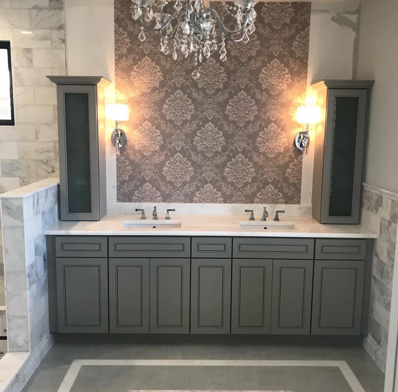 Custom bathroom with gray vanity and crystal chandelier - luxury bath remodel Naples